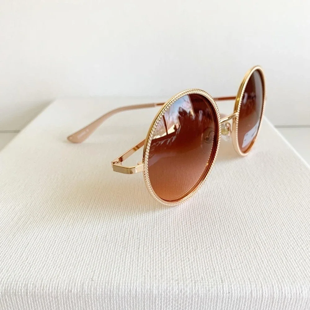 New with tage FGX rose gold round sunglasses